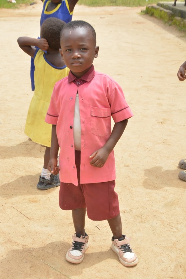 Student wearing an incomplete school uniform